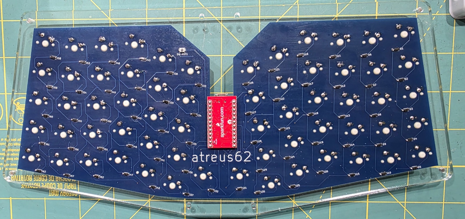 Underside of the PCB showing the finished solder joints for all switches and the new Pro Micro
